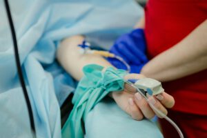 a closeup of an IV line in a patient's arm