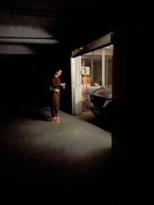 A dark parking garage interior