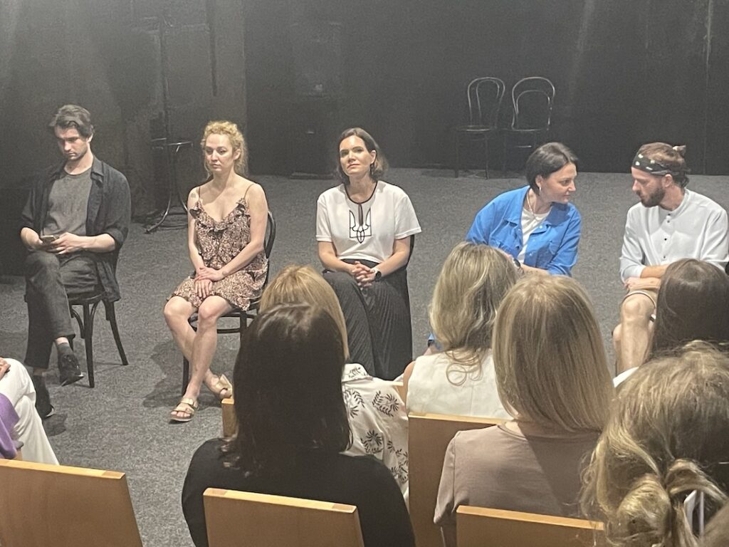 Therapists and actors debrief a play.