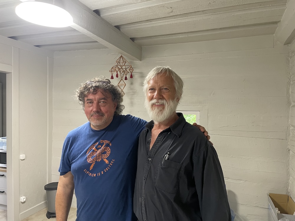 Two smiling men